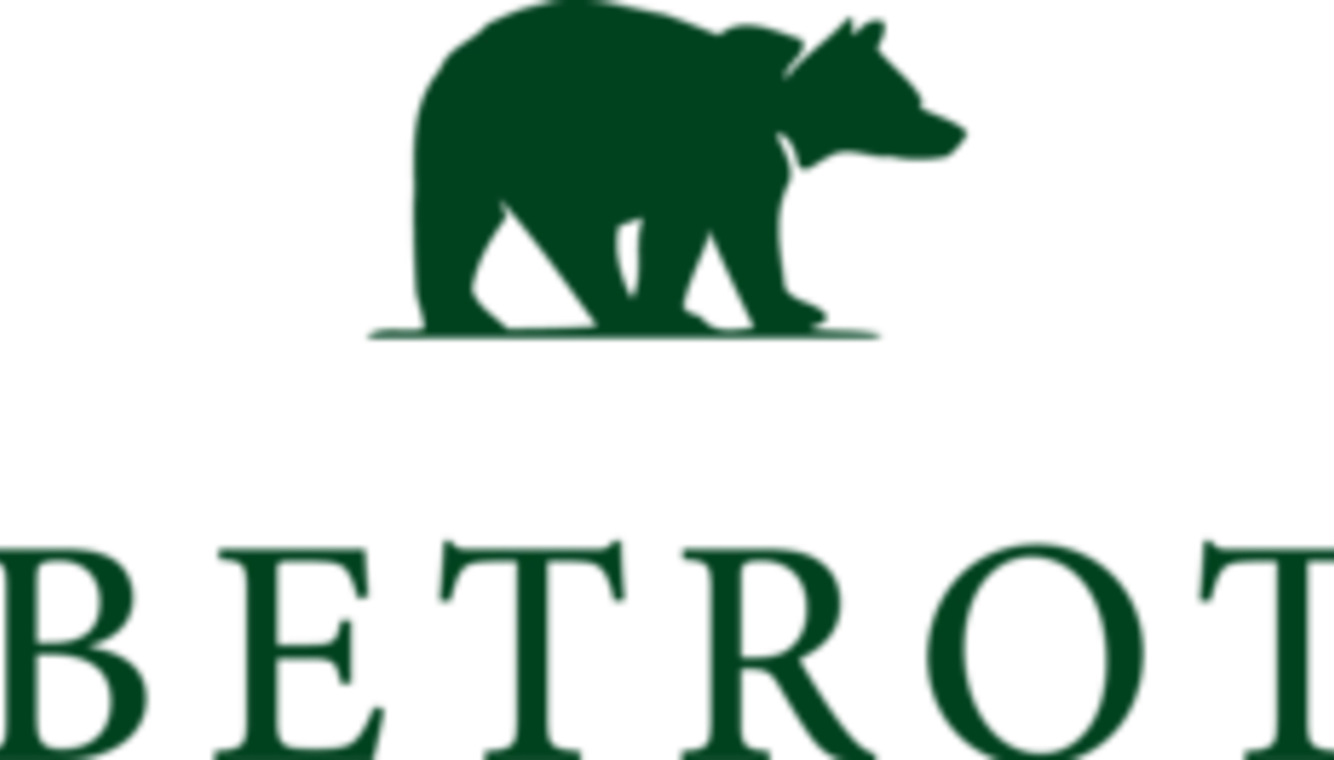 Grünes Logo des Unternehmens Globetrotter: Ein stilisierter Bär über dem Schriftzug „Globetrotter“ auf transparentem Hintergrund. | © Globetrotter