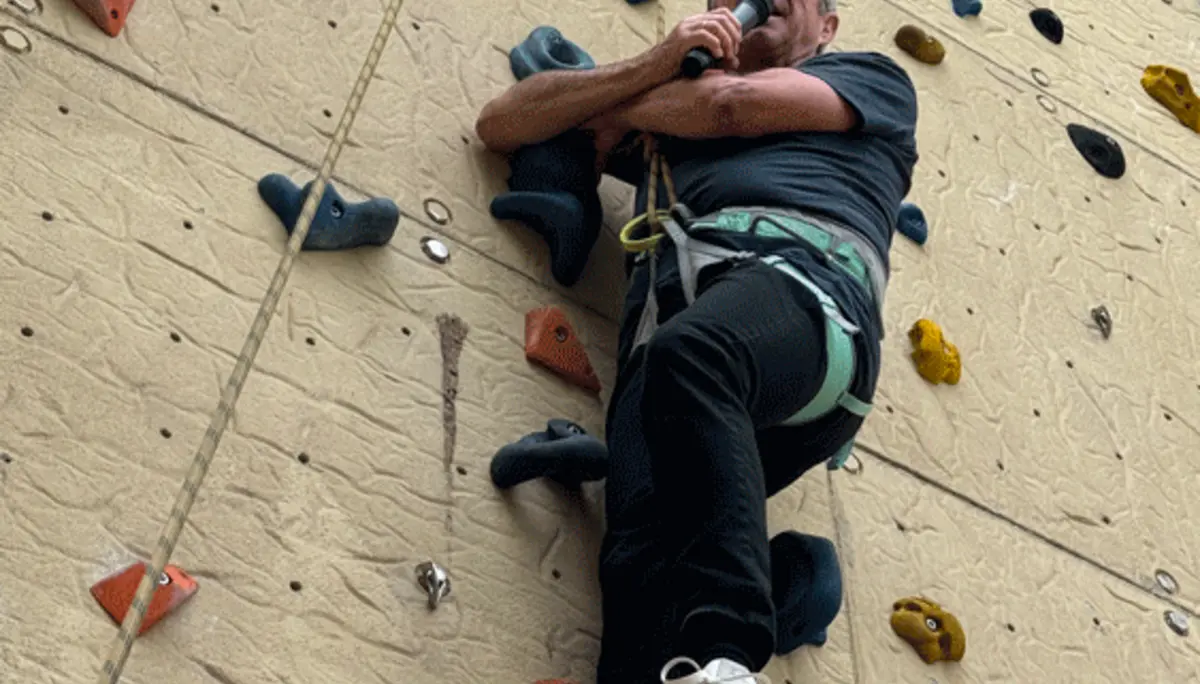 Kletterer mit Mikrofon | © DAV Dortmund